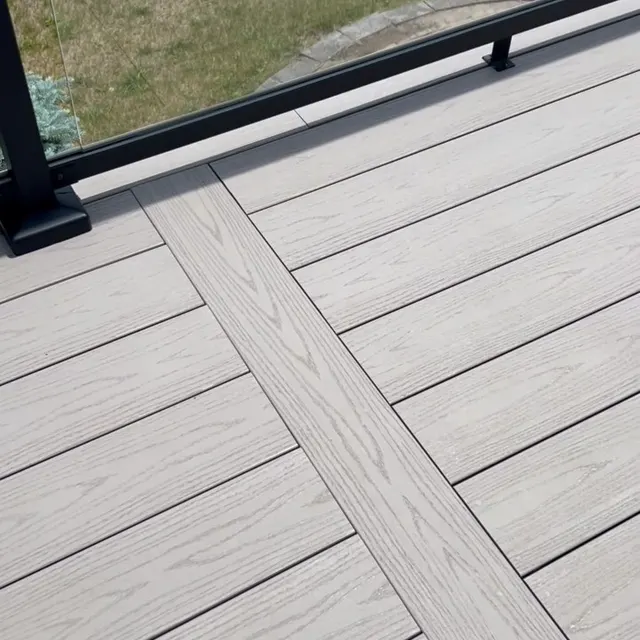 Composite deck board and railing detail