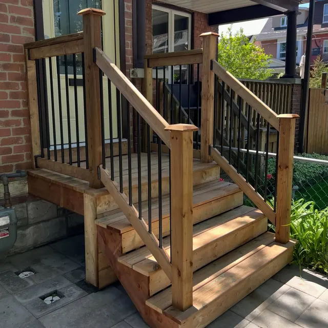 Custom-built wood deck stairs and railings